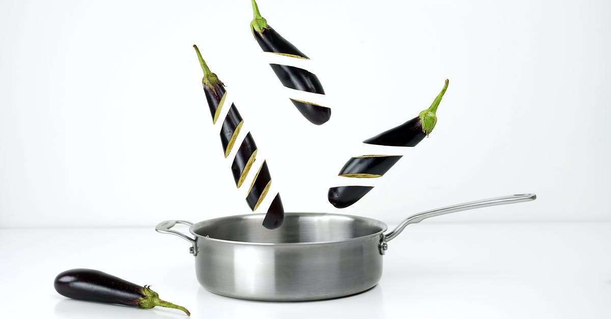 Preparing/Seasoning/Using a Carbon Steel Pot - Three Sliced Eggplants and Gray Stainless Steel Non-stick Pan