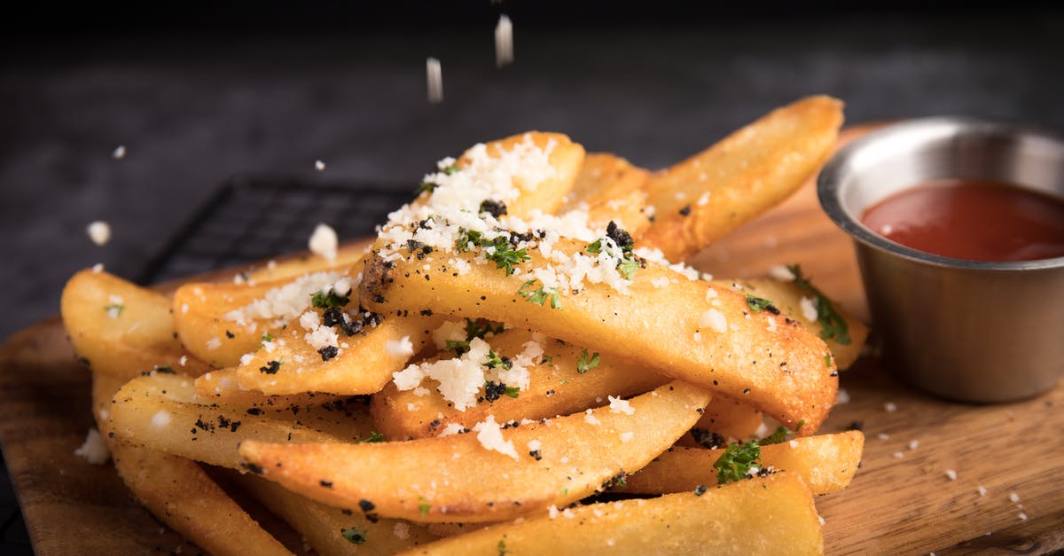 Pre-preparing breakfast scramble -- potatoes - Close Up Photo Of Deep Fried Potatoes