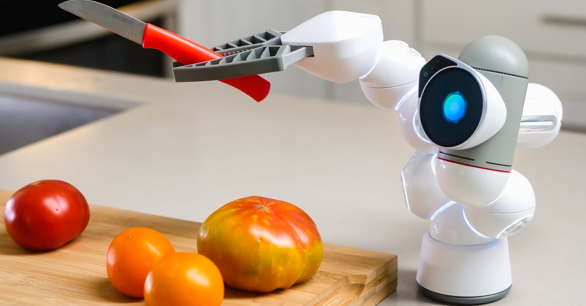 Pressure canning tomatoes without added acid - White and Black Robot Toy on Brown Wooden Chopping Board