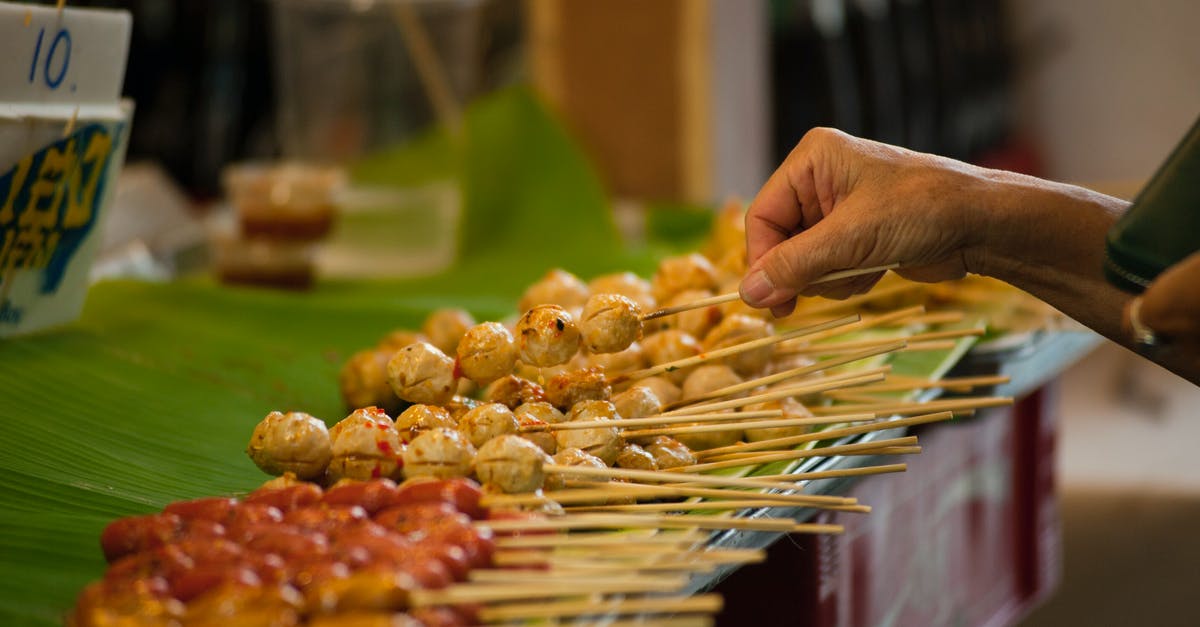 Pressure cooked stock out overnight, still safe? - Tilt Shift Photography of Street Foods in Stick