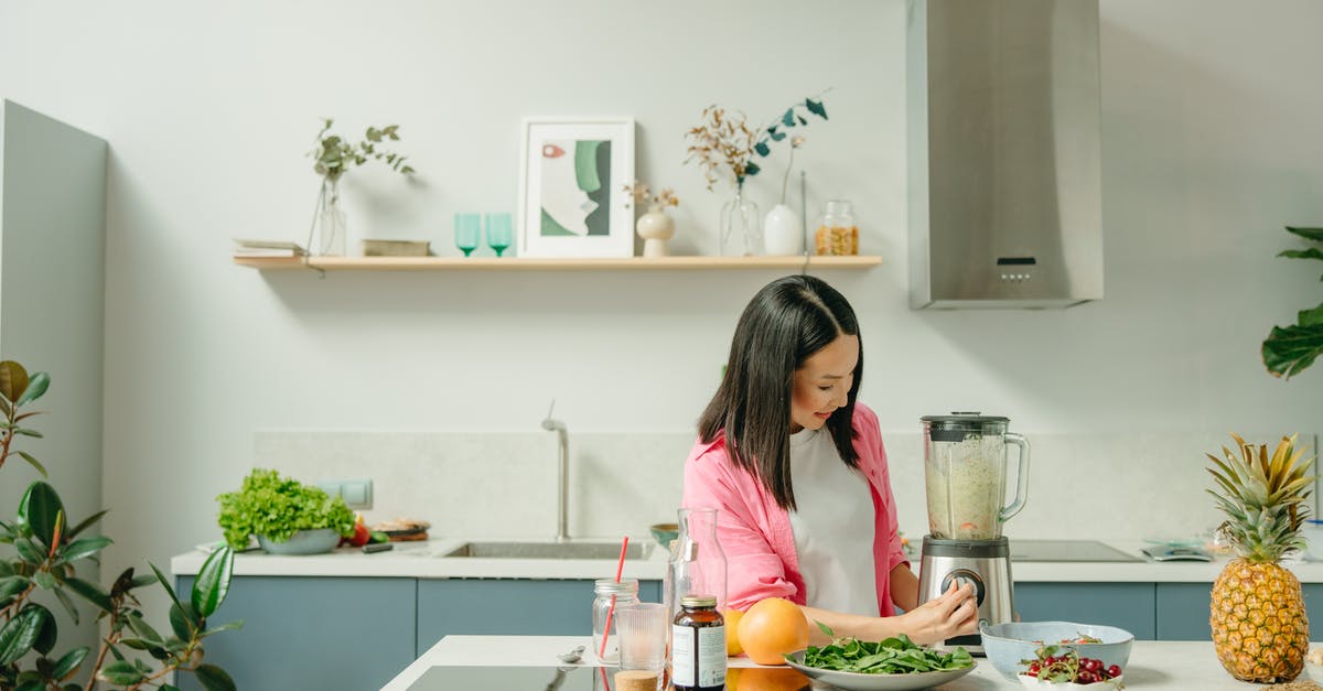 Pressure cooking green beens - A Woman Using a Blender