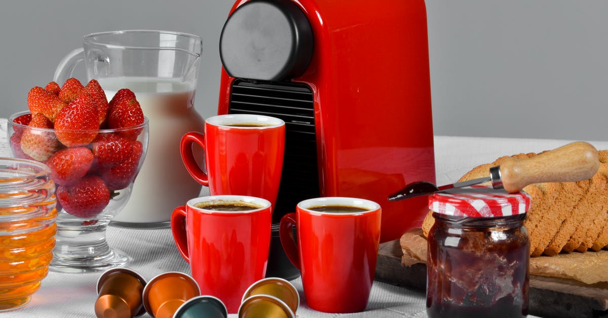 Prevent syneresis effect in agar-agar fruit jam - Red Ceramic Mug Filled With Coffee Near Jam Jar on Table