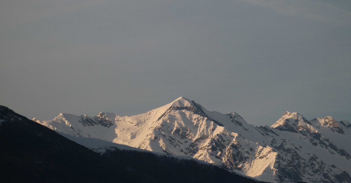 Preventing Warping when Roasting at High Temperature - High mountains covered with hoarfrost against blue cloudless sky in snowy highland area on cold winter day in wild nature