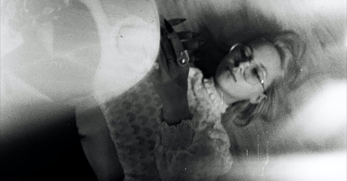 Problem: grainy kefir - Grayscale Photo of Woman Lying Down