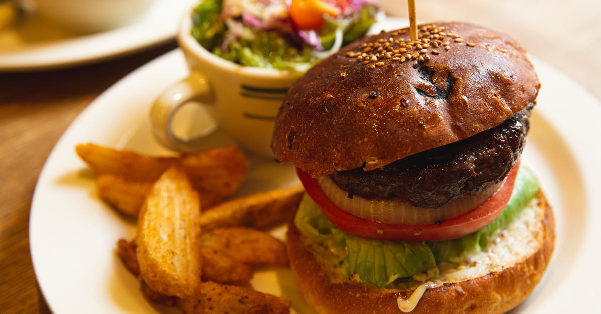 Procedure for sous vide potato salad prep - Delicious burger with vegetables and fries