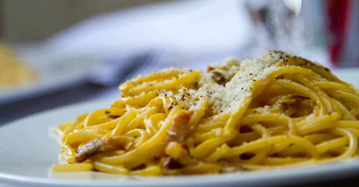 Processed cheese in pesto - Shallow Focus Photo of Pasta