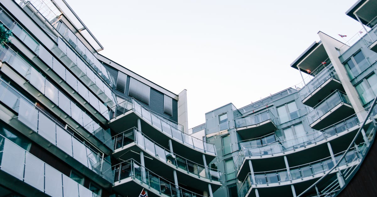 producing kefir grains from commercial kefir? - Modern geometric glass building with balconies