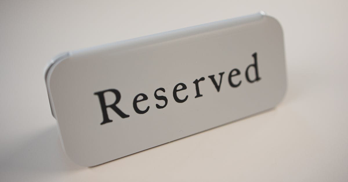 Proper use of a honing steel - Metal signage with black letters saying Reserved on gray background used in cafes and restaurants