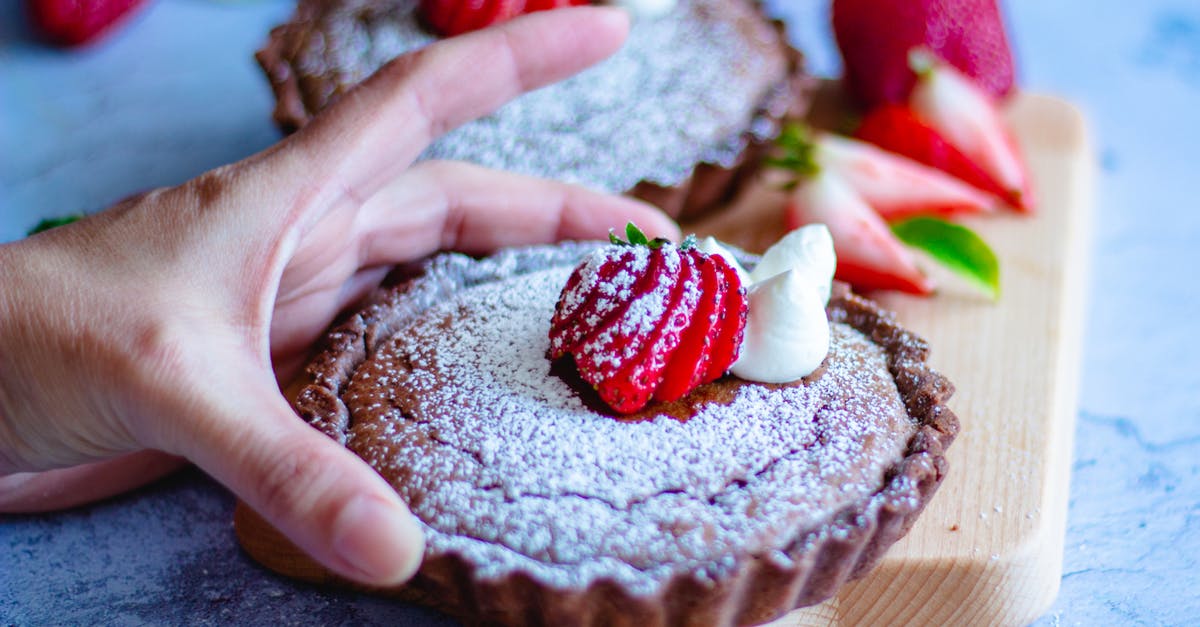 Puff pastry chocolate tart? - A Person Holding a Tart