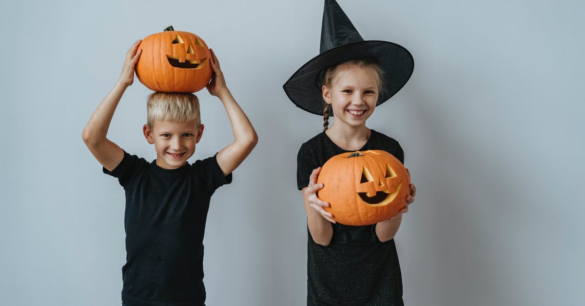 Pumpkin mousse looks grainy and slightly watery - Boy and Girl Holding Jack O Lantern