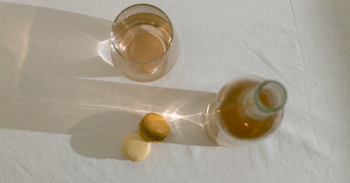 "Cloth" that's edible (or even better, yummy)? - Glass bottle near edible macarons on table