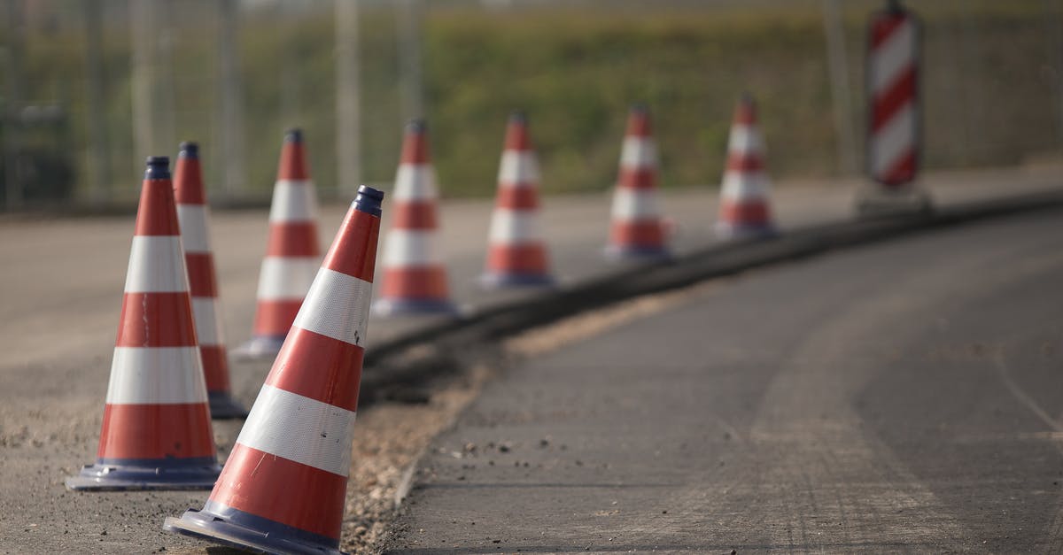 Ravioli filling to edge ratio - Red and White Traffic Cone on Road