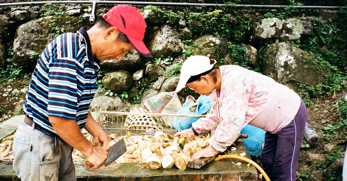 Raw Kale - Korean side dish - Ethnic workers preparing food in street