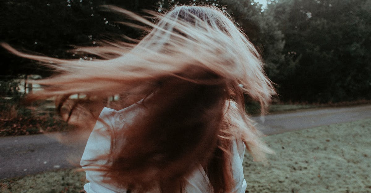 Re-Heat meringues after having them in the fridge for a long time? - Woman with flying hair in summer park Re-Heat meringues after having them in the fridge for a long time? - Woman with flying hair in summer park
