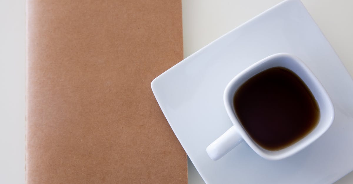 Remove tannins from tea without removing caffeine - Overhead Shot of a Ceramic Cup with Black Tea