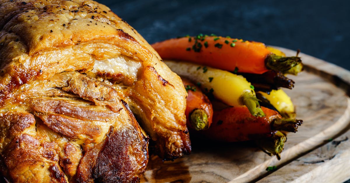 Removing hair from pork belly - Close-Up Photo Of Fried Meat