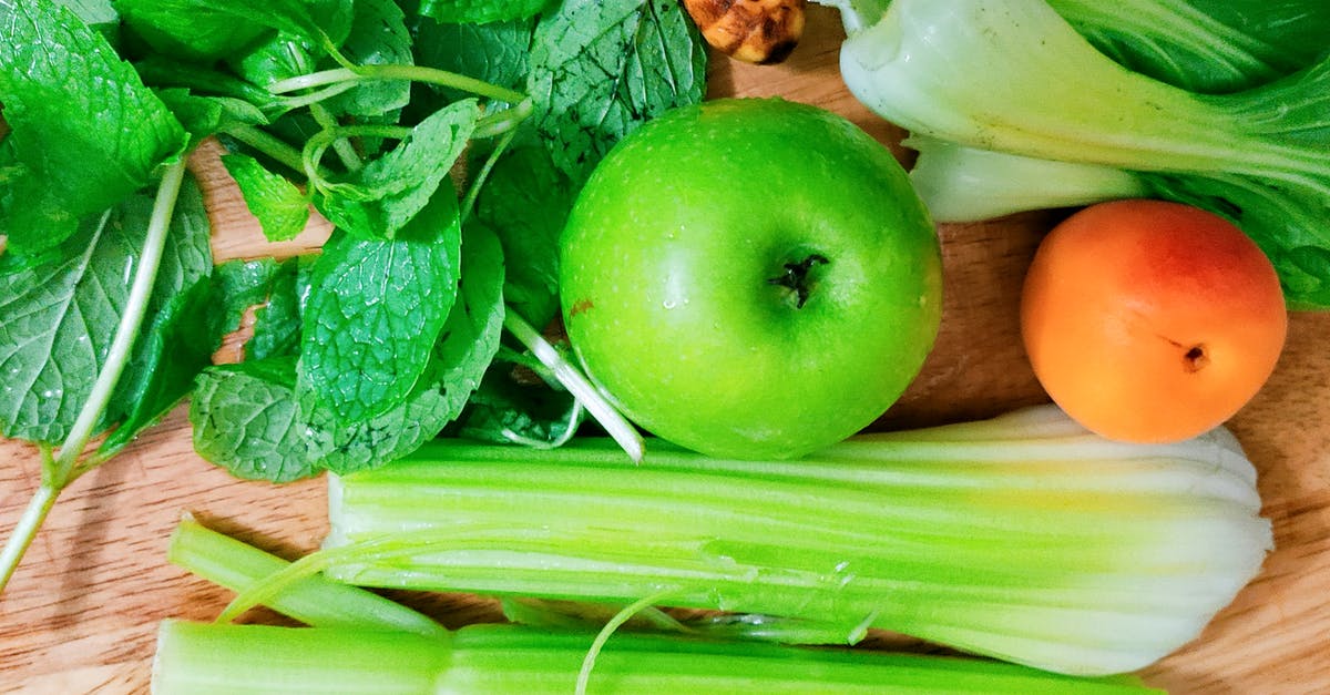 Replacement for celery with equivalent nutrients? - Top view composition of fresh organic fruits and vegetables arranged on wooden table