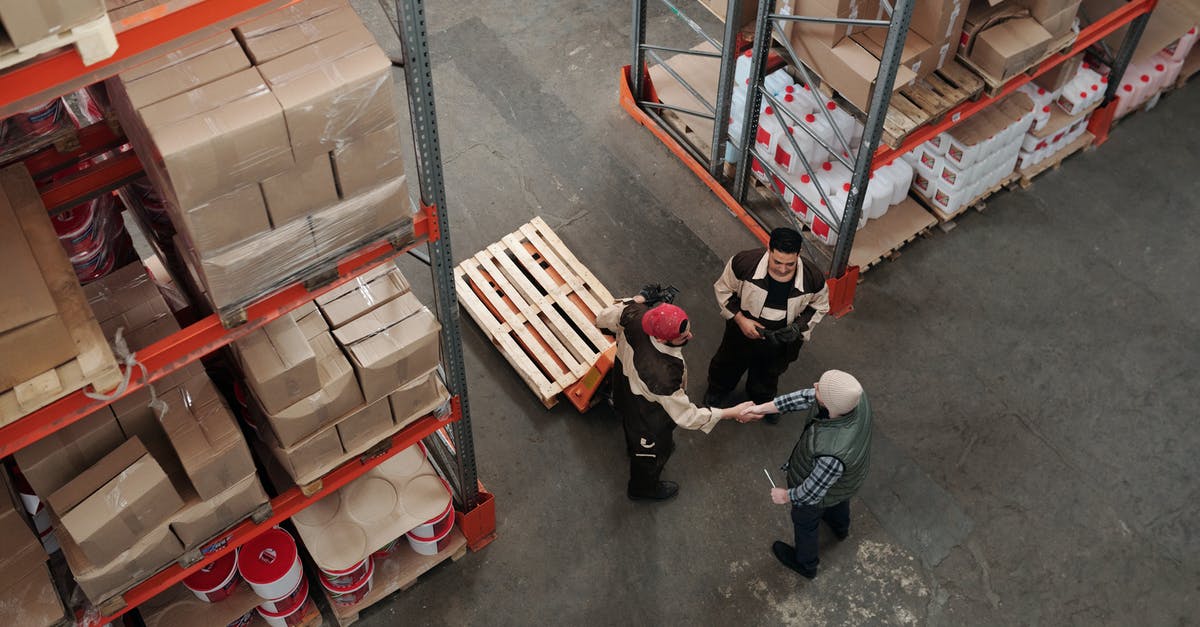 re:salad dressing shelf storage [duplicate] - Men Working in a Warehouse