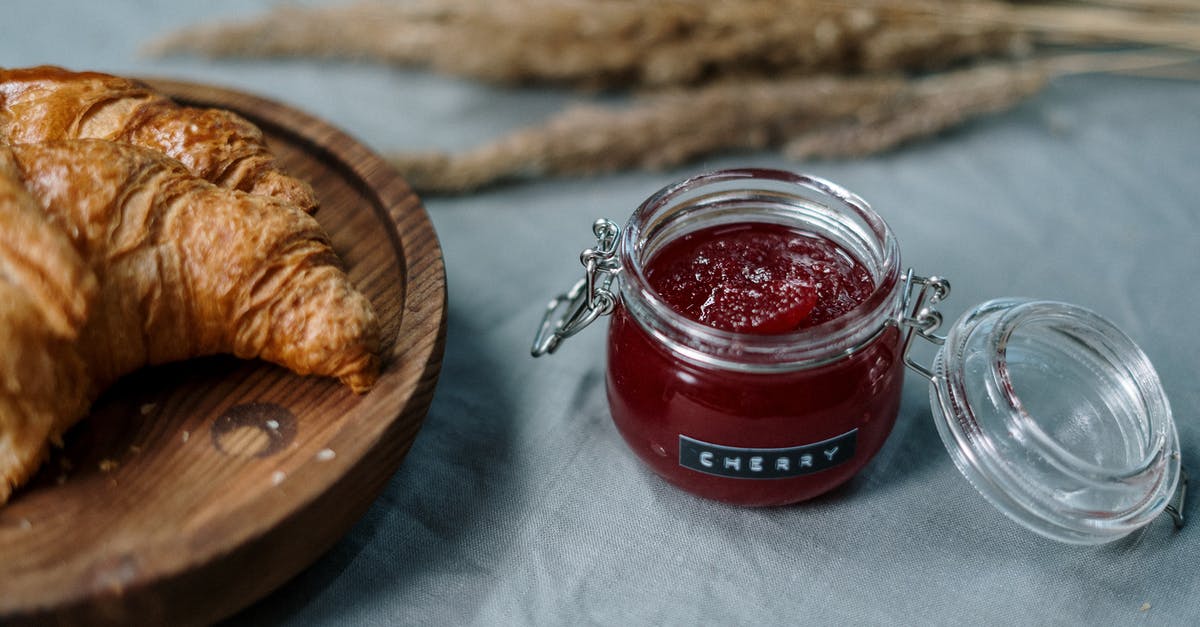 Rescuing contaminated home made jam - possible? - Clear Glass Jar With Red Liquid Inside