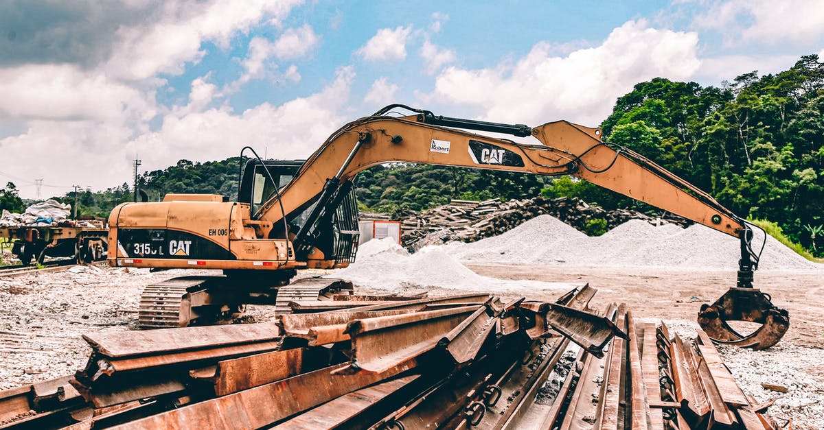 Rigging equipment for steaming large amounts at once - Yellow and Black Caterpillar Excavator Claw