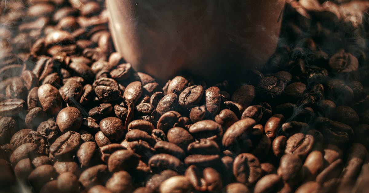 Roasted Hazelnut soil? - Coffee Beans on Black and Gray Surface