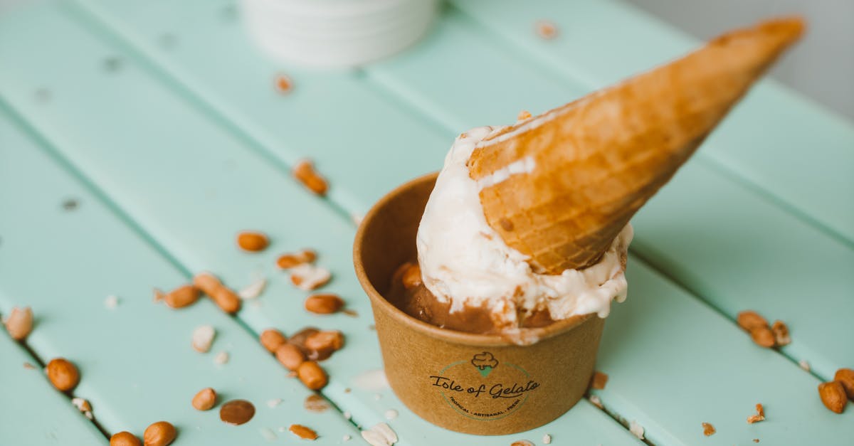 Roasted Peanuts - Ice Cream on Brown Wooden Cup