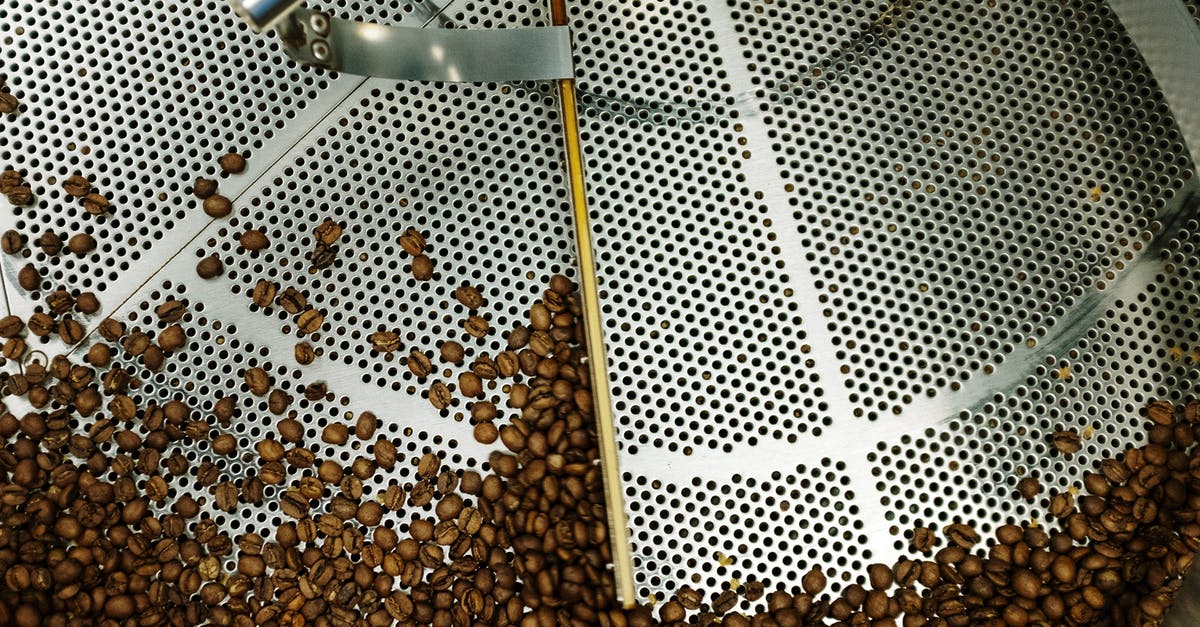 Roasting a turkey in a roaster oven - Brown and White Wooden Stick on White and Black Textile