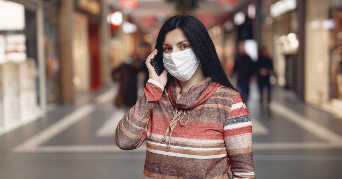 Safe uses for sourdough starter discards during building phase [closed] - Worried casual female wearing protective mask and looking at camera while answering phone call against blurred background in city center during coronavirus pandemic