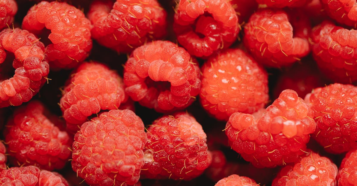 Safety of raspberry seeds in smoothies - Bunch of ripe red delicious raspberry