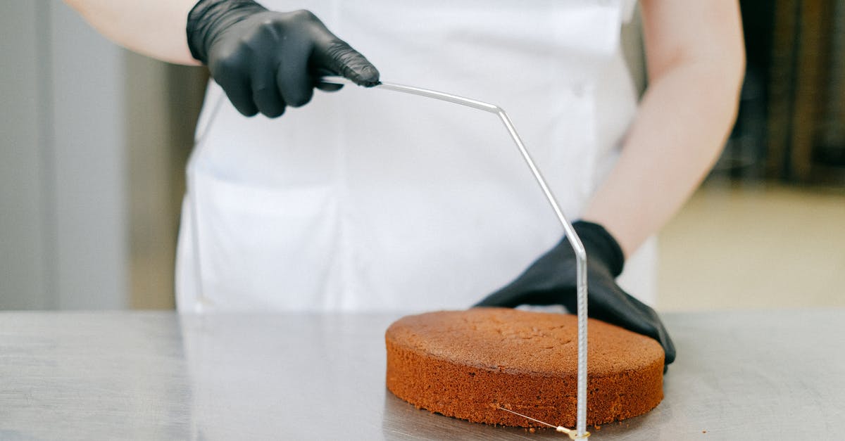 Salmon slicer vs Brisket slicer? I can only afford one - Person Cutting a Cake