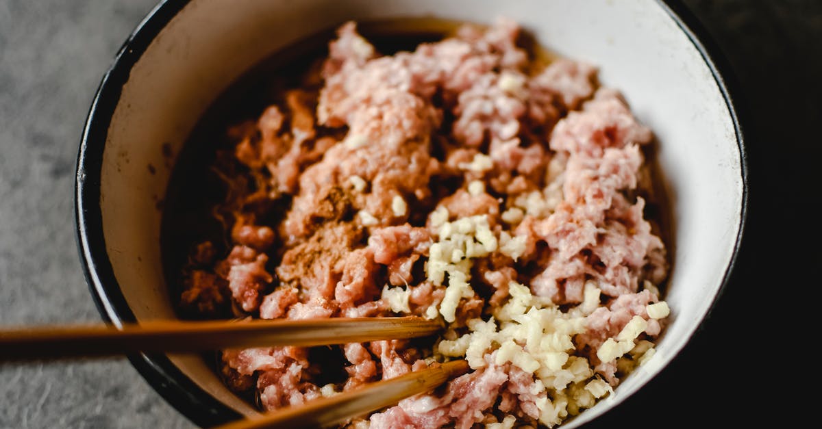 Salting Pork Chops - Minced Meat in Ceramic Bowl