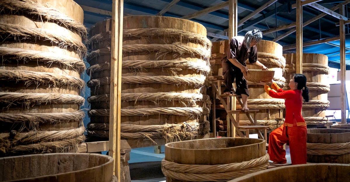 Sauce thickener for large batch - Colleagues working in warehouse with barrels