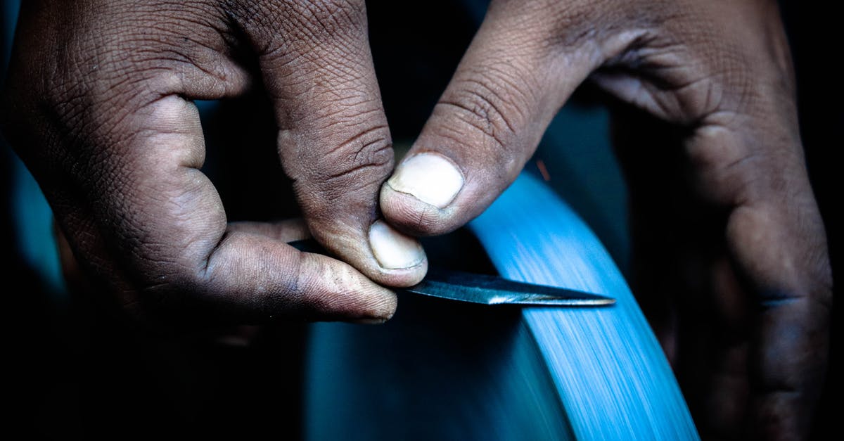 Sharpening a knife - Person Sharpening Knife