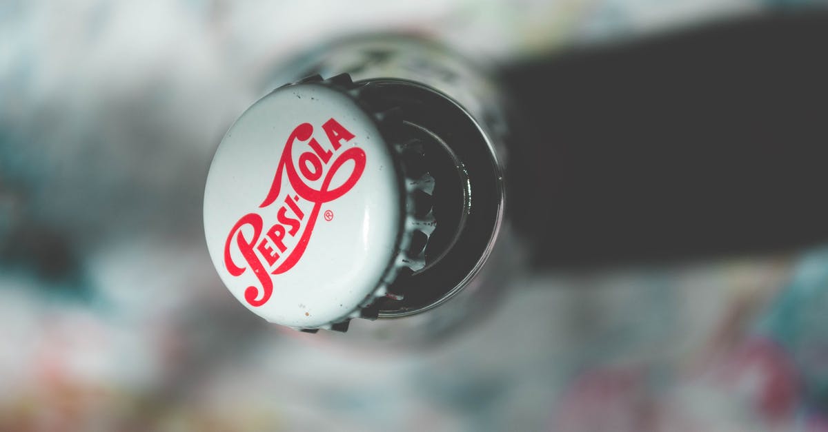 Should a roast be covered in liquid in a slow-cooker? - Shallow Focus Photography of Pepsi-cola Bottle Cap