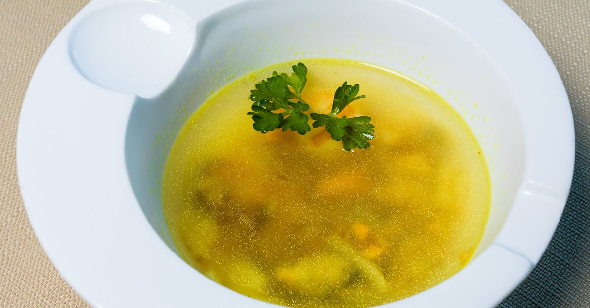 Should I avoid meat broth when cooking for vegetarians? - Soup in White Ceramic Bowl