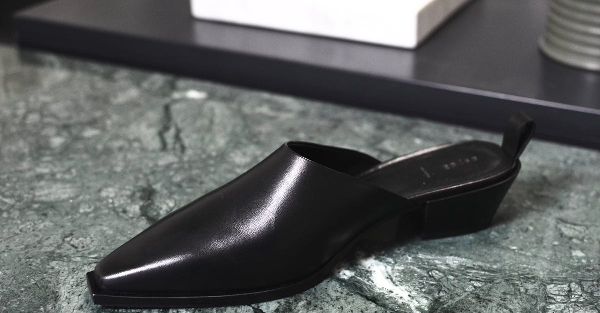 Should I buy a used flat griddle? - Stylish shiny shoe on marble surface