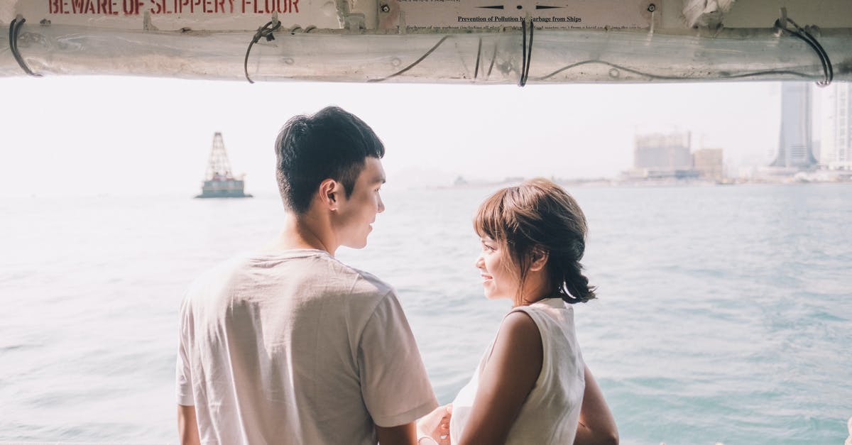 Should I close the vessel while soaking nuts? - Young Asian couple standing on yacht