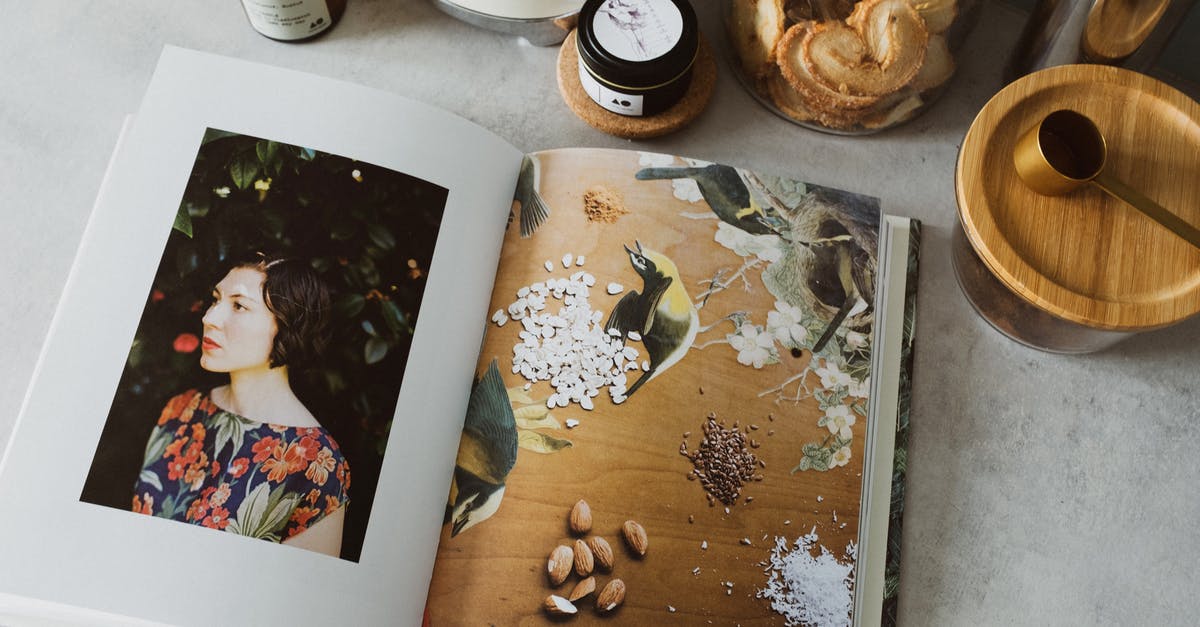 Should I read  ingredient weight as prepared or unprepared weight? - Opened cookbook on table in kitchen