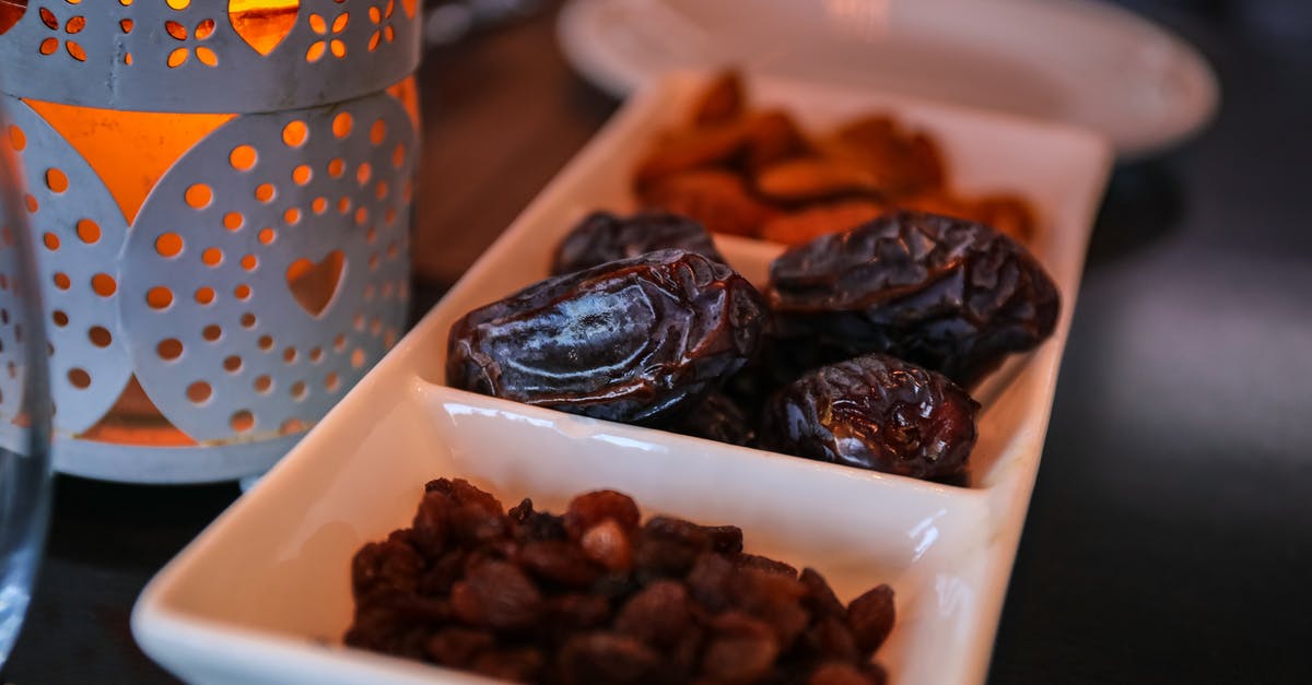 Should raisins be washed before eating? - Close-Up Photo Of Raisins And Dates