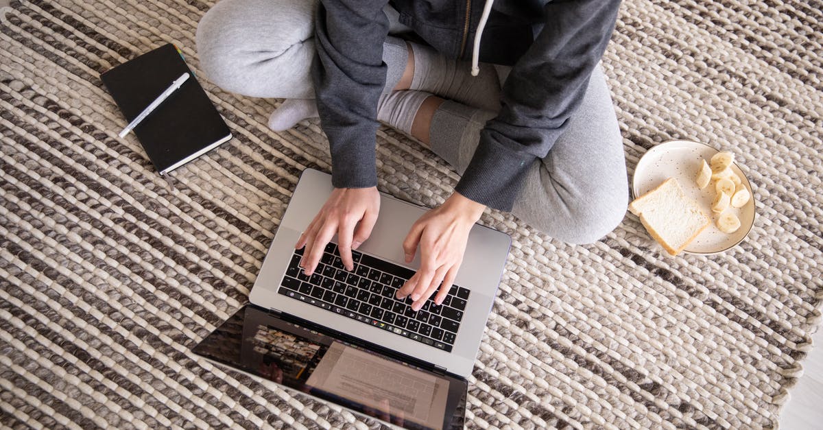 Should vacuum sealed food be exposed to air when thawing? - Photo Of Woman Using Laptop