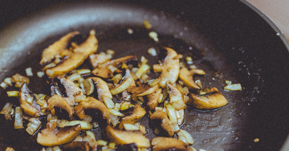 Should you avoid cooling a frying pan with water? - Closeup Photography of Sauteed Garlic