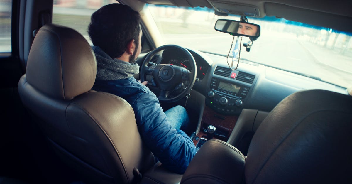 Shoulder Steak vs London Broil - Man Wearing Blue Jacket Sitting Inside Car While Driving