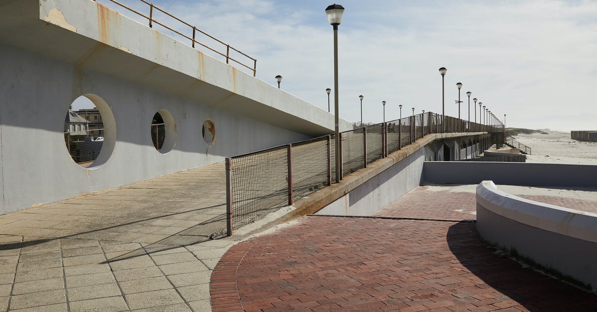 Simple way to pit plums - Pier with concrete tile and streetlights