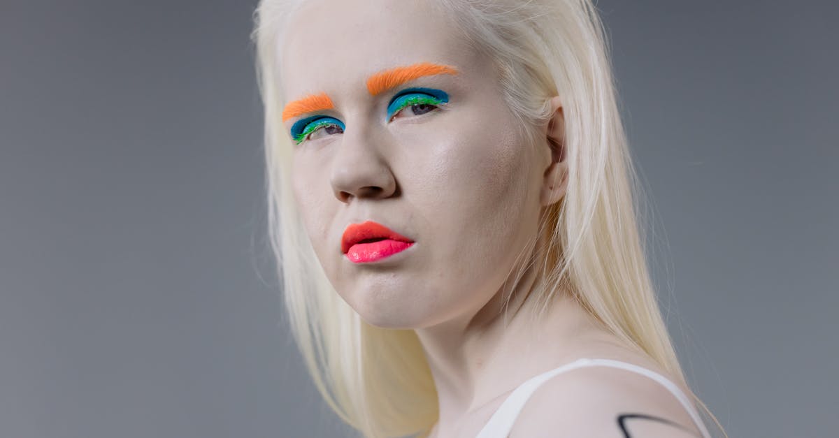 Skin oranges 24-h in advance? - Woman with Neon Makeup