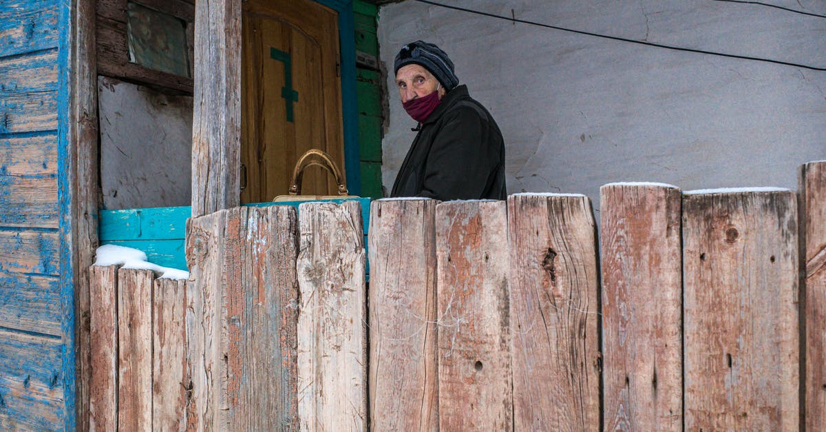 Slow cooker lid gasket smell - A Person Wearing Mask Near a Wooden Door