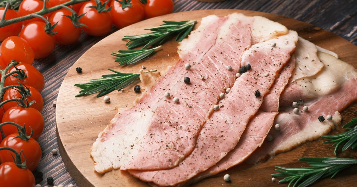 Smoked ham roast: what do I do with it? - Raw Meat on Brown Wooden Chopping Board