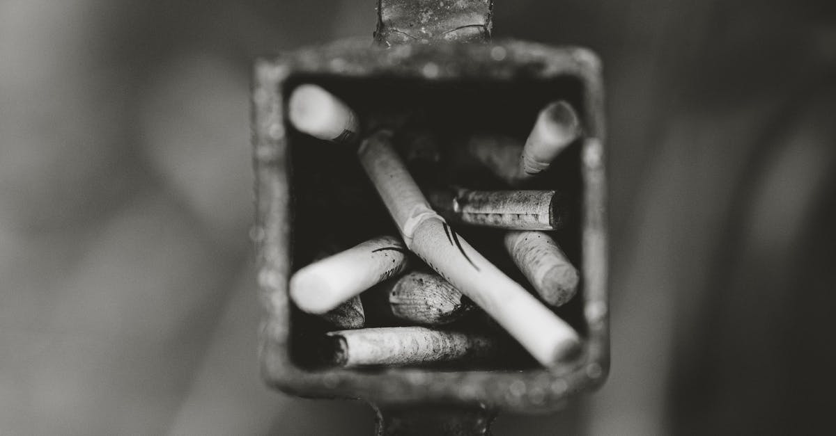 Smoking pig butt: how to resume? - Grayscale Photography of Cigarette Butts in Ashtray