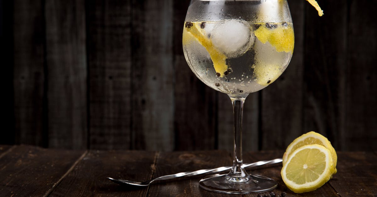 Soaking fruit in alcohol - Lemonade on Brown Surface