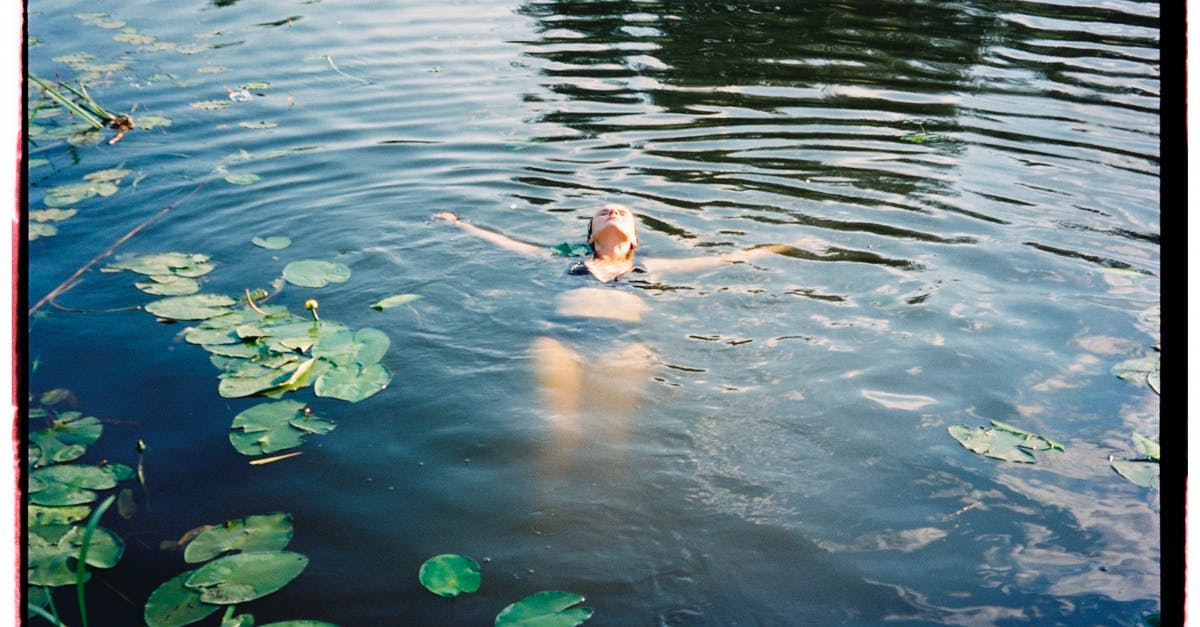 Soaking millet before making ogi - Girl in Pink Bikini Swimming on Water
