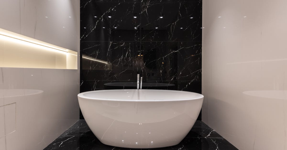 Soaking starches in water for better frying - Interior of modern bathroom in apartment